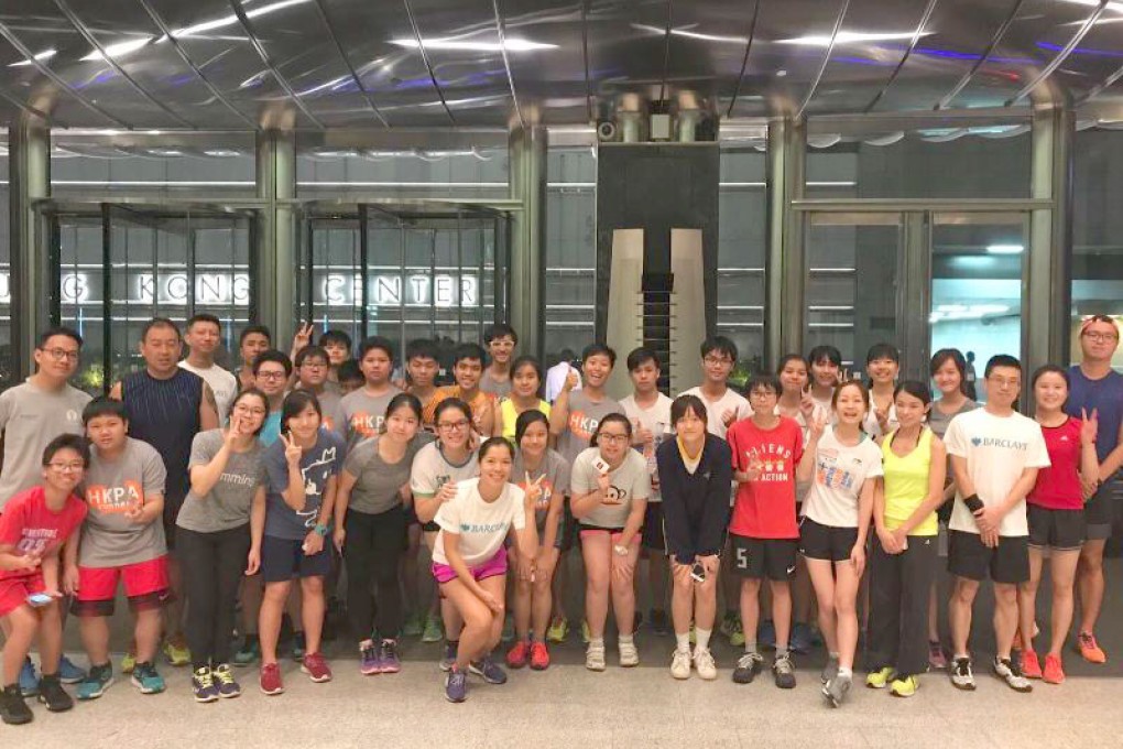 Providing guidance and support to young people from HK Playground Association through the WERun event.